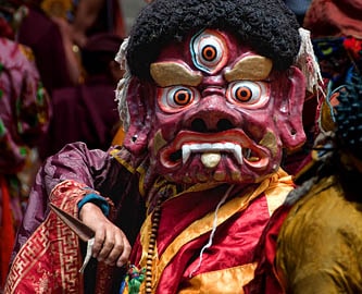 Mask dance during the festival at Hemis Buddhist monastery (gompa), Indus valley, Ladakh
