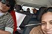 Group picture with driver inside the car, taxi tour in Ladakh