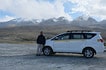 Driver Stanzin and his Toyota Innova Crysta car, Ladakh