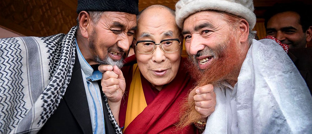 Two main religions of Ladakh: Buddhism and Islam. Dalai Lama pulling beards.