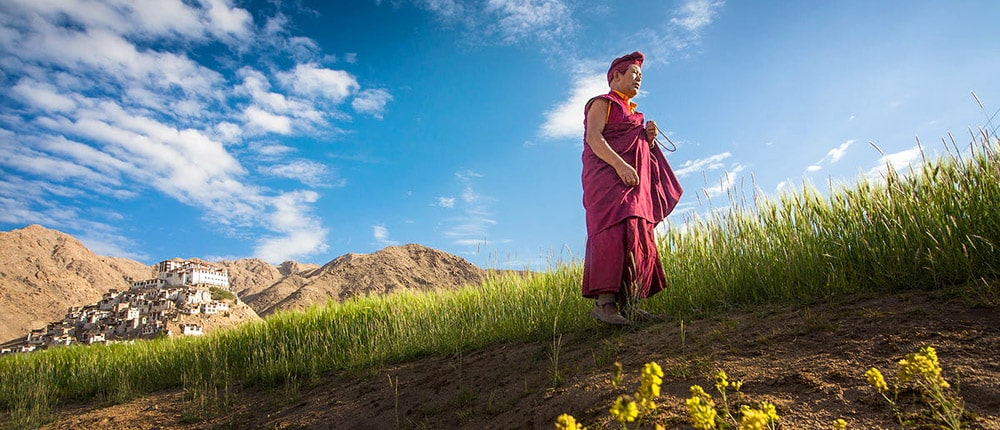 Buddhist monk near a monastery in Ladakh
