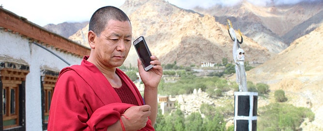 Monk with a mobile phone, Leh, Ladakh