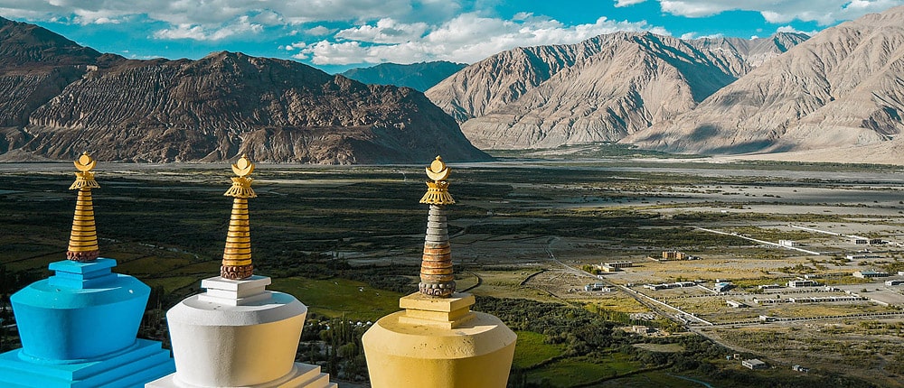 Panoramic view of the Nubra valley with 3 stupas, Ladakh