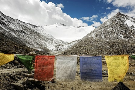 Prayer flags at Chang La Pass (5,360m), on the way to Pangong Lake, Ladakh