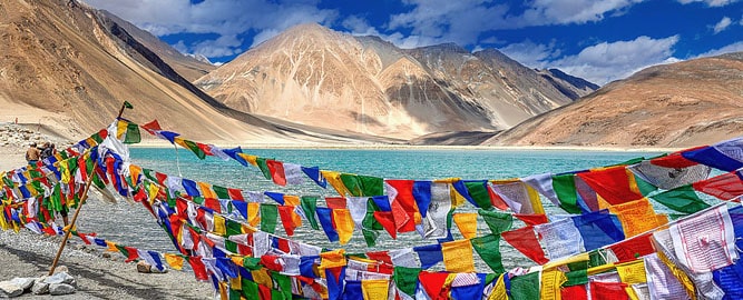 Pangong Lake and prayer flags, Leh-Ladakh Tour Package
