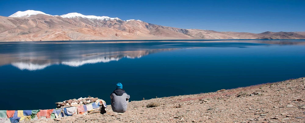 Man contemplating Tso Moriri lake, Ladakh